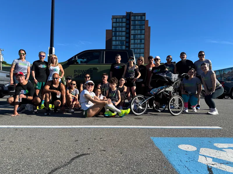 Power Shape community gathered beside the gym van