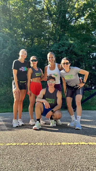 A group wearing Power Shape shirts on an outdoor path